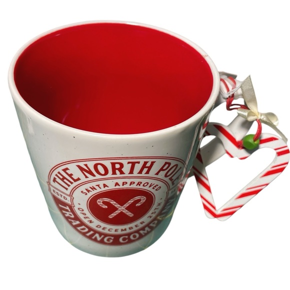 The Mistletoe Company Santa North Pole Trading Company Mug Red Inside NWT - Picture 2 of 12